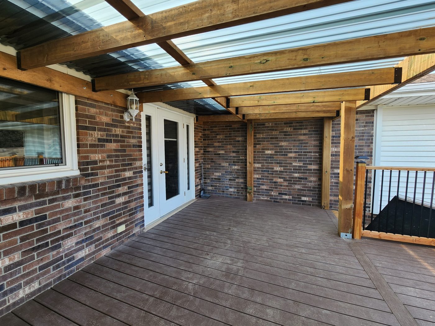 Finished deck with a covered pergola