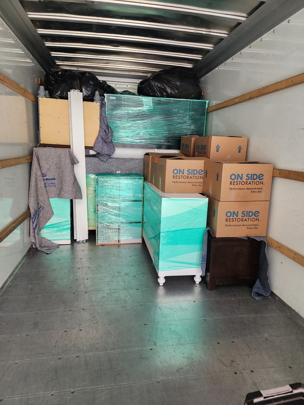 Furniture wrapped and loaded in the moving truck