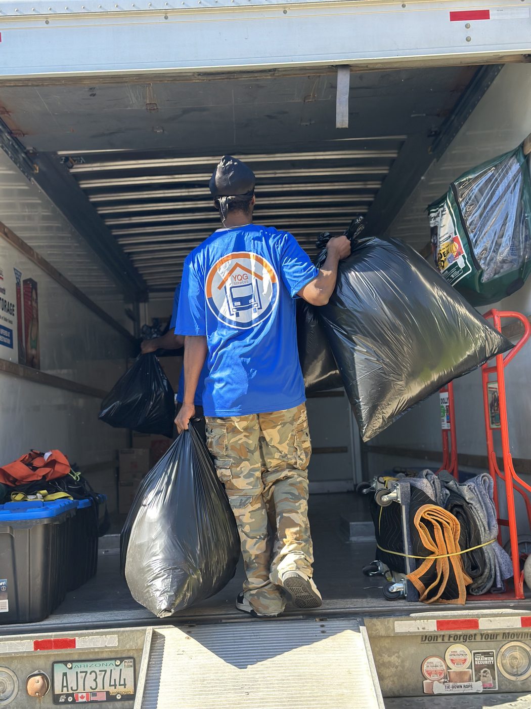 YQG crew member loading the truck