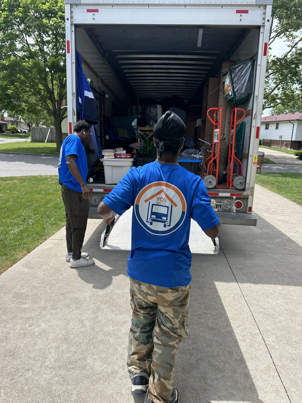 YQG crew loading the moving truck