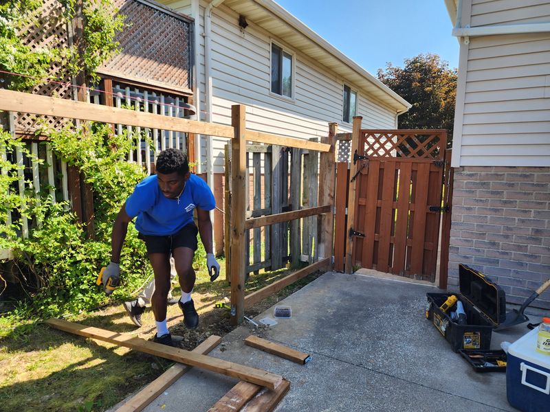 YQG crew building a fence