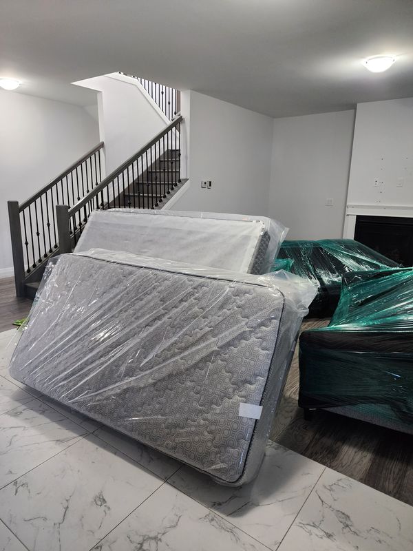Mattresses and furniture wrapped for moving